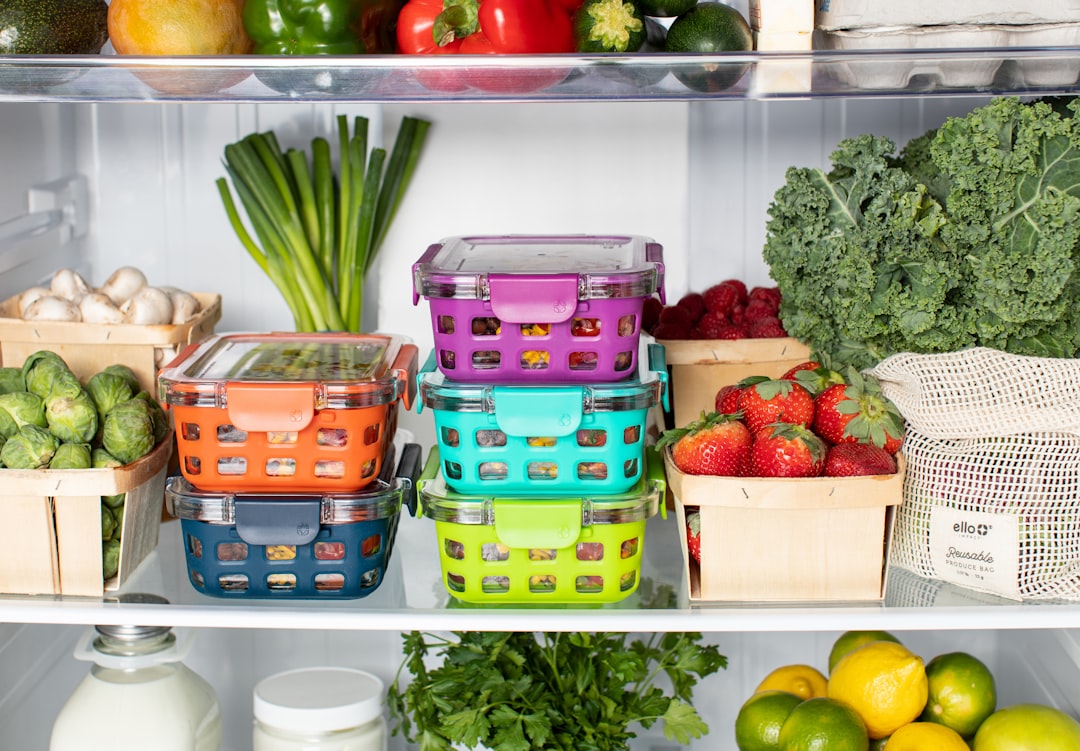 A clean, well-organized refrigerator with food sorted by category
